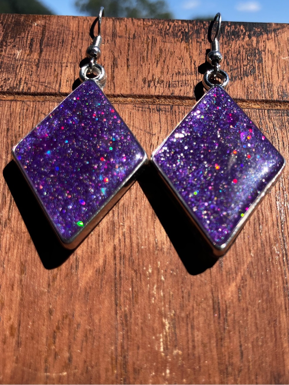 Purple glitter diamond shaped dangling earrings
